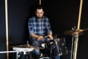 Drummer Playing in the Garage